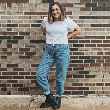 WOMAN WEARING ALL BLACK CHELSEA BOOTS